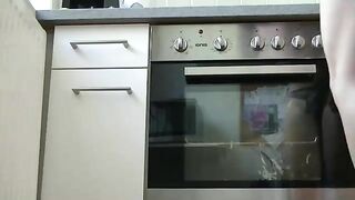 Housewife with pink hair shits in the kitchen