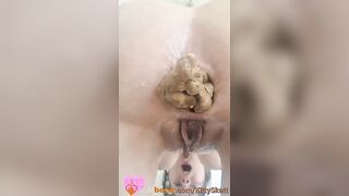 Woman takes a huge shit on the bathroom floor