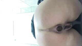 Woman plays with shit in her ass crack