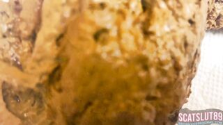 Chick drops a huge log on the floor