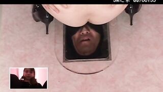 Girl gets her face fucked while eating shit under a glass box