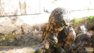 Woman takes a ride in a muddy shithole