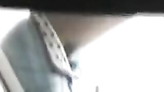 Woman spreads her ass in the mirror