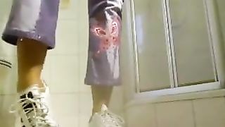 Pee pants in bathroom