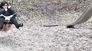 Lady pissing on the swing