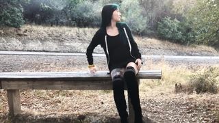 Punk chick masturbates and pisses by a busy road
