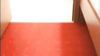 Standing piss in hotel bathroom