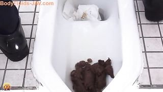 Japanese girl was caught shitting in a public bathroom