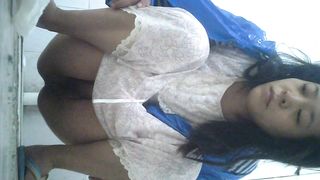 Pretty Asian babe with hairy pussy pooping