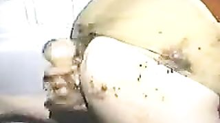 Dirty lady in stockings playing with her ass and shit