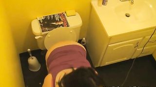 Sexy tattooed brunette chick pooping