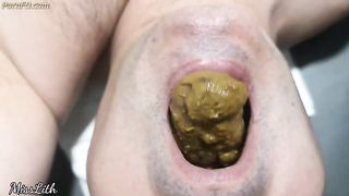 Beautiful brunette chick in glasses pooping in the mouth