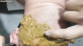 Beautiful brunette chick in glasses pooping in the mouth