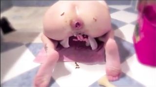 Anal insertion with thick dildo and poop