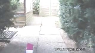 Cute lovely lady pooping in the garden