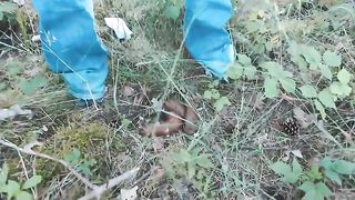 Blonde lady poops in the pine woods