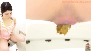 Young Japanese babe poops yellow load