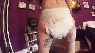 Sexy babe in her potty diaper