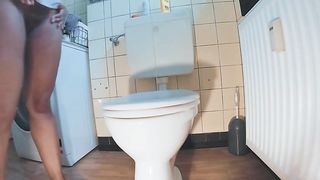 Black scat bitch pooping in the toilet