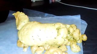 Yummy yellow poop with black pepper