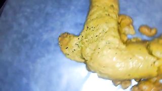 Yummy yellow poop with black pepper