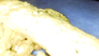 Yummy yellow poop with black pepper
