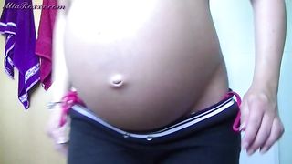 Nine month pregnant showing constipated poop