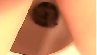 Cute brunette chick poops in the toilet