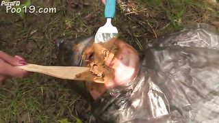 Cheeky girls pooping on slave in the forest