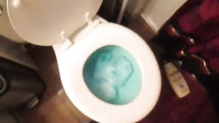 Redhead poops into her clogged toilet
