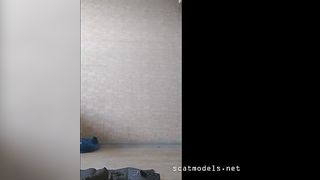 Pretty young redhead poops slowly