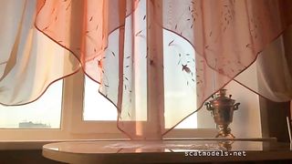 Young girl poops big turd on the table