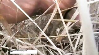 Blonde hot chick pooping in the grass