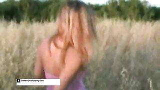 Blonde hot chick pooping in the grass