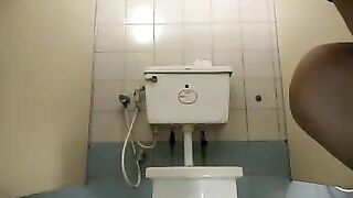 Sexy amateur brunette girl pooping in toilet