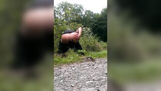 Gorgeous big booty lady pooping in the forest