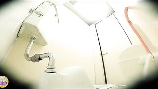 Woman squats and takes a shit in a public toilet