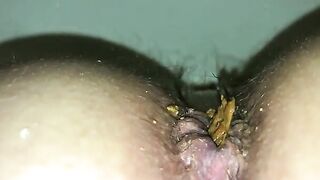 Closeup of thick green poop and hairy ass