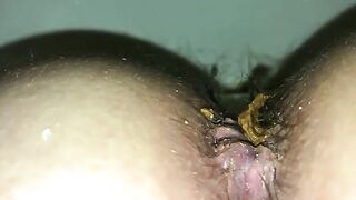 Closeup of thick green poop and hairy ass