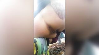 Amazing Asian lady pooping in the field