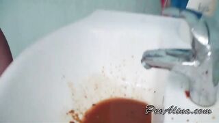 Cute Asian babe in bikini poops in the sink