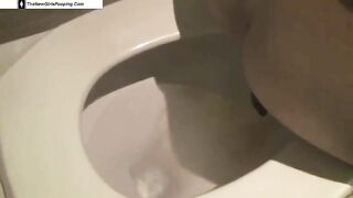 Amateur young and hot looking girl poops in the toilet
