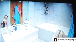 Blonde taking a dump in the toilet