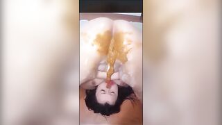 Girl shitting on her own face
