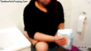 Chubby lady pooping in toilet