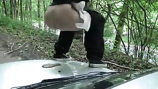 Girl liquid shitting on her car hood