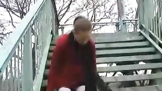 Sexy German slut poops on the stairs outdoor
