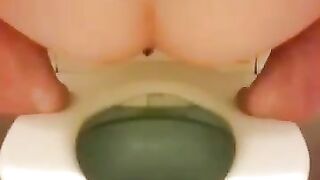 Gorgeous hotny chick pooping in toilet