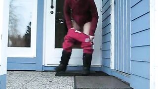 Brunette wife pooping in front of the house door