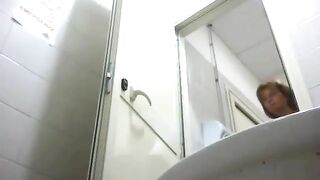 Mature woman poops in toilet